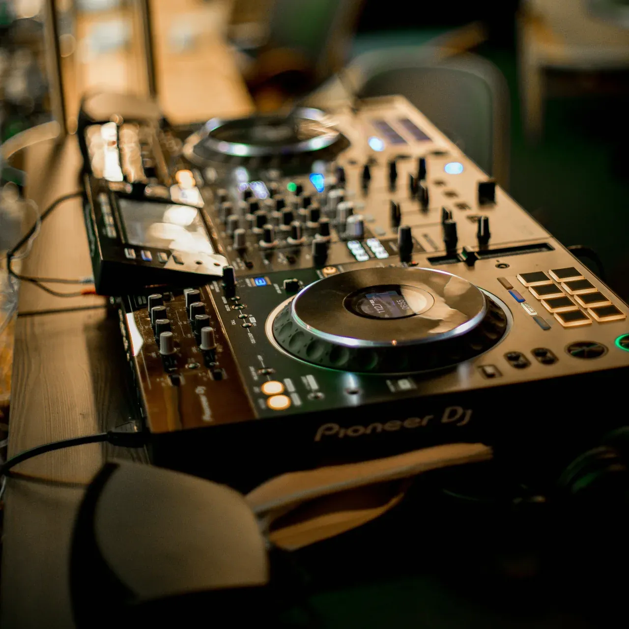 DJ players and a mixer set up for an event